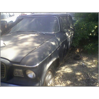 1973 Mercury Cougar - This vehicle appears to be an older model car in need of restoration.