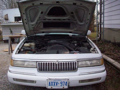 1992 Mercury Grand Marquis - hood is cut out in the triangle and back rectangle