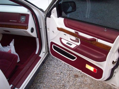 1992 Mercury Grand Marquis - Interior view of a 1992 Mercury Grand Marquis, focusing on the driver's side door panel details.