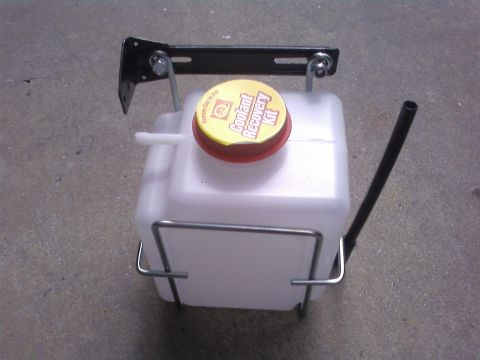 1978 Ford Bronco - A coolant recovery tank with a yellow cap is shown. The registry claims it is a 1978 Ford Bronco, but this is incorrect.