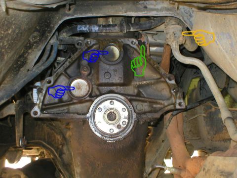 1983 Ford Bronco - Since I didn't have a pilot bearing puller, I removed the flywheel to keep the grease off of it. The upper blue is a coolant bore plug; the…