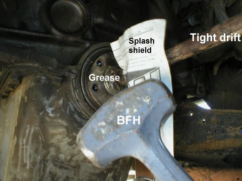 1983 Ford Bronco - After packing the old pilot with grease, I found a steel rod that barely fit and a LARGE hammer. When the rod is driven in, the grease push…