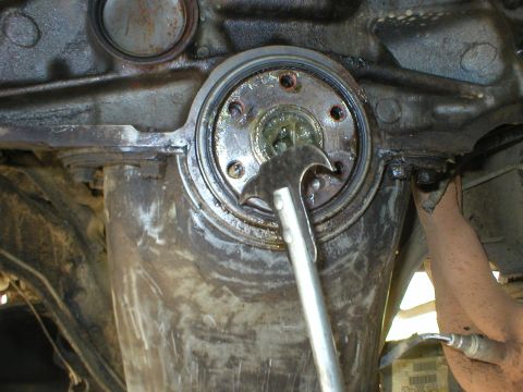 1983 Ford Bronco - The last thing is to pull the rear main, which can be done with a small flathead screwdriver. It's not very tight. To improve the seal betw…