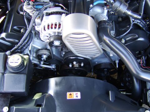 1996 Mercury Grand Marquis - Engine bay components including alternator, belts, and pulleys are visible in this close-up shot.