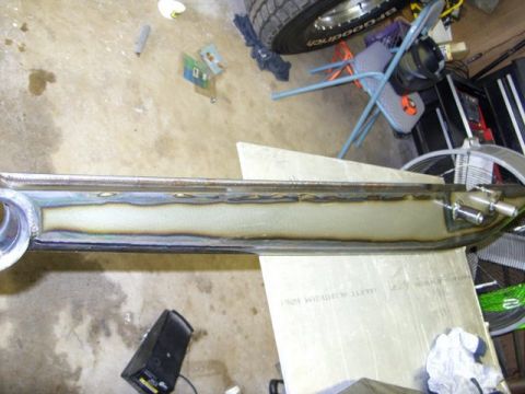 2008 Ford Bronco - Close-up of a fabricated metal part, likely for a vehicle modification or repair.