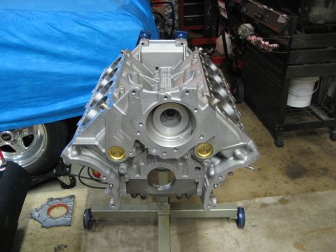 2007 Ford Mustang - Photograph of a bare V8 engine block on a stand, not a technical document.
