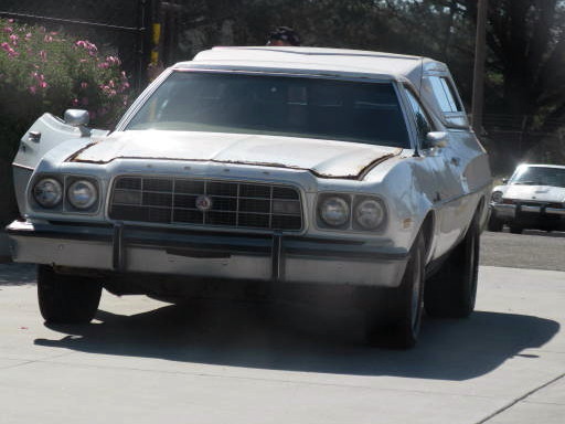 1970s Ford Ranchero front view, driver's door open