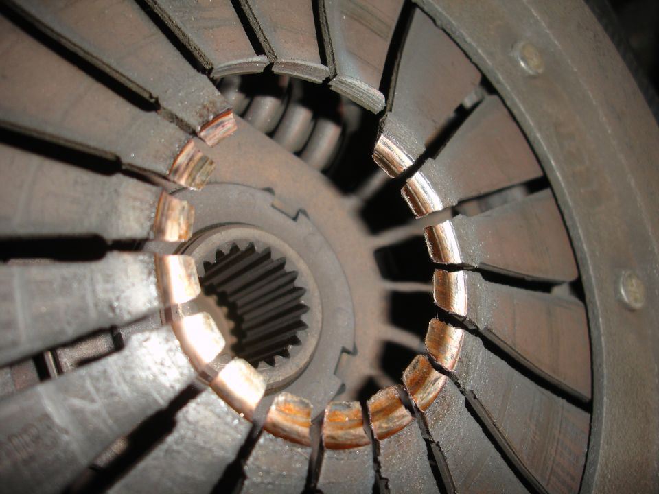 Close-up photo of a clutch pressure plate diaphragm and splined hub