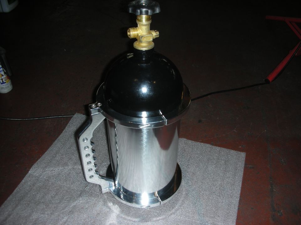 Pressurized container with brass valve