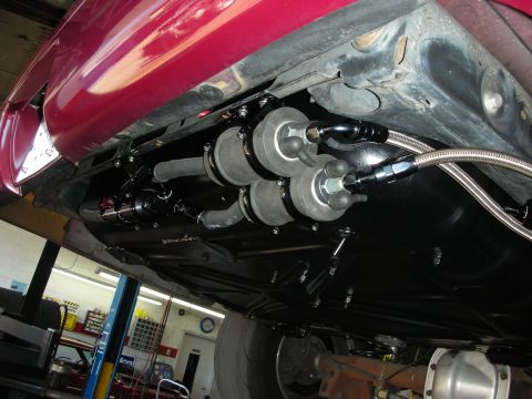 1992 Ford Crown Victoria - Custom dual fuel pump assembly installed on a vehicle's undercarriage.