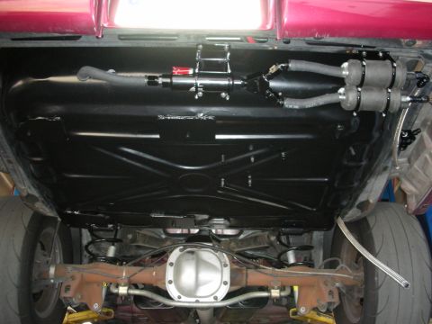 1992 Ford Crown Victoria - Custom fuel system installed on the undercarriage of a vehicle.