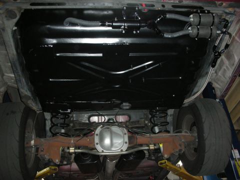 1992 Ford Crown Victoria - The underside of a 1992 Ford Crown Victoria displays a clean chassis and an upgraded fuel system.