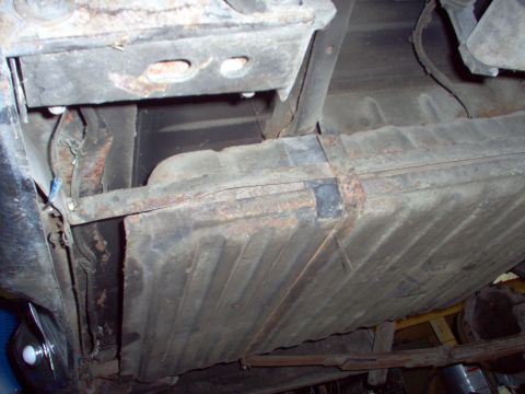 1970 Ford Ranchero - Underside view of the fuel tank and frame of a 1970 Ford Ranchero.