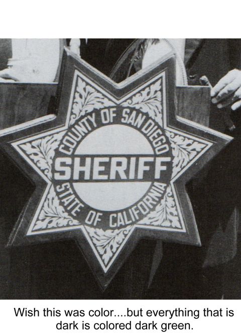 1991 Ford LTD Crown Victoria - A star-shaped badge for the San Diego County Sheriff's Department is shown.