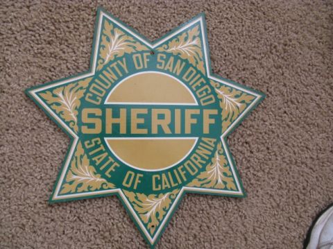 1991 Ford LTD Crown Victoria - A star-shaped badge for the San Diego County Sheriff, State of California.