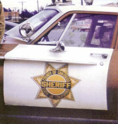 1991 Ford LTD Crown Victoria - The door of a San Diego County Sheriff's Department vehicle features its official star emblem.