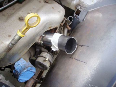 1969 MINI Cooper - Custom exhaust pipe modification in progress, showing a new section being attached.
