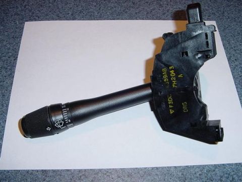 2007 Ford Mustang - A close-up view of a black windshield wiper control stalk with various settings indicated.