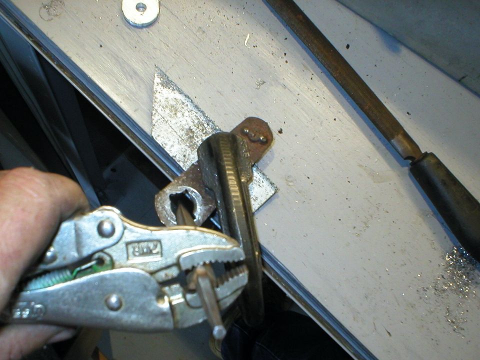 Then I filed it out to the right shape, checking frequently to keep it tight on the shaft.