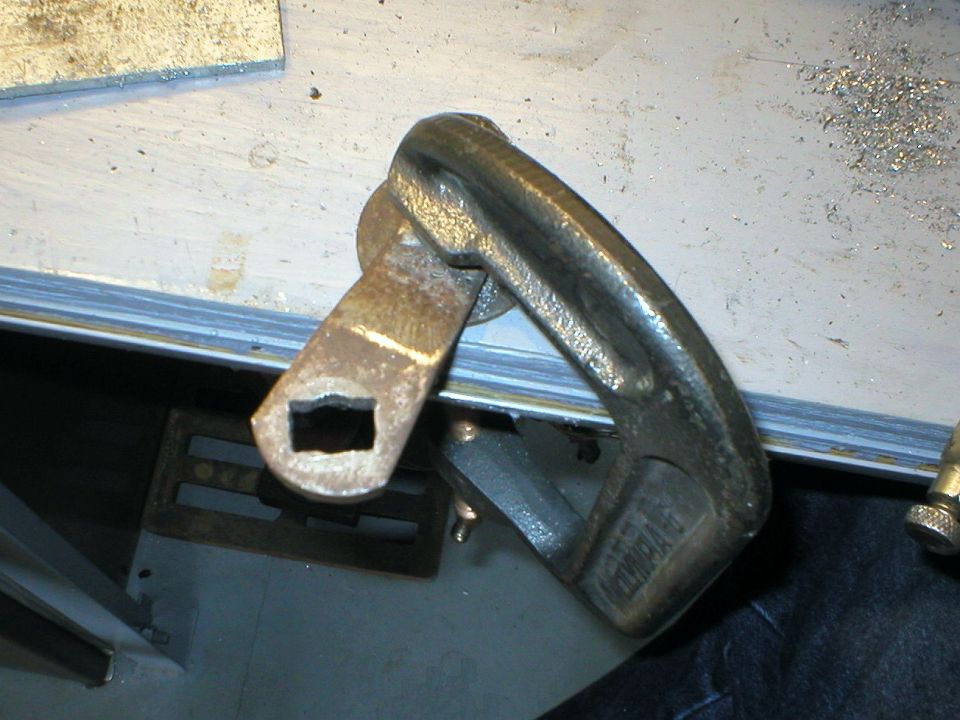 I was pretty happy with how it came out.  But after driving it for a week, I realized I had cut the slot at the wrong angle and the metal was wearing.  When it's made at a factory, the punching process work-hardens the steel around the edge, but my filing process hadn't done that, so the hole was slowly rounding.  All that effort was wasted.