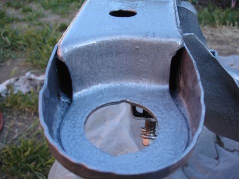 1995 Ford Taurus - A close-up view of a painted suspension component, possibly a control arm or subframe piece.