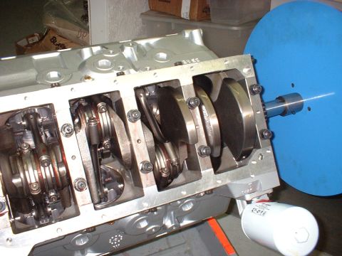 1969 Mercury Cyclone - Close-up view of an engine block assembly, showing the crankshaft and connecting rods, with an oil filter mounted below.