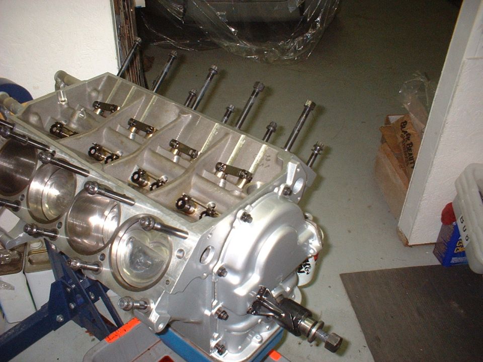 Engine block on stand, showing cylinders and internal components