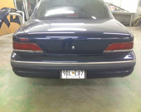 1993 Ford Crown Victoria - factory chrome taillight trim