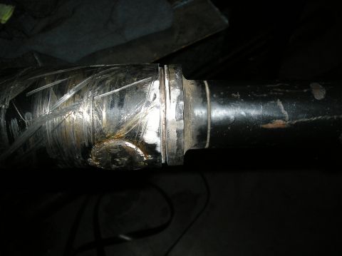 1986 Toyota Hilux - A close-up view shows a metal shaft with significant scratching and a welded repair on the left side. It connects to a flange on the right…