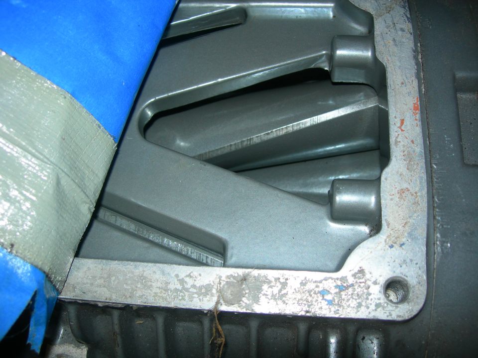 Internal view of a supercharger with blue and gray tape