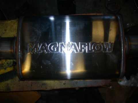 1984 Ford Bronco - Close-up of a Magnaflow exhaust muffler, showing the embossed brand name.