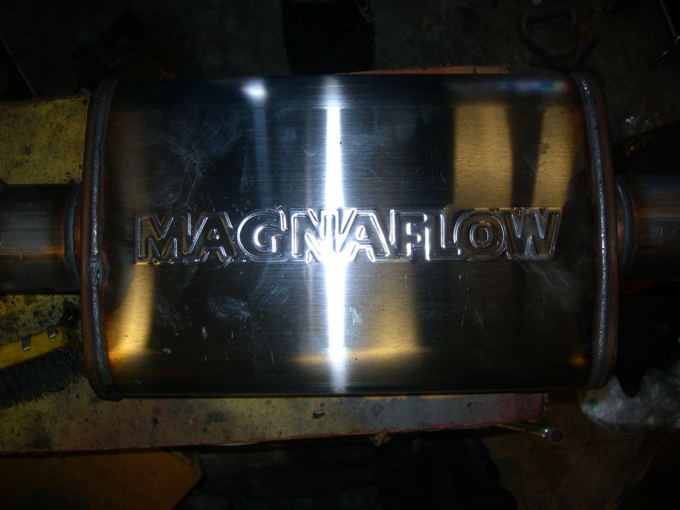 Magnaflow exhaust muffler with embossed logo