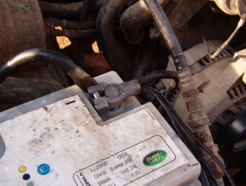 1983 Ford Bronco - The cooled & wire-brushed terminal is now installed on the cleaned battery post, making a connection that will last for years with no furth…