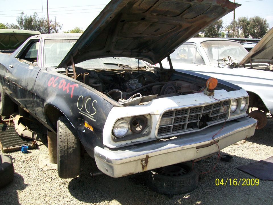 1972 Ford Ranchero front 3/4 view with hood open, showing engine and OCS markings