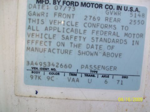 1972 Ford Ranchero - Close-up of a vehicle's identification sticker, indicating it was manufactured in July 1973.