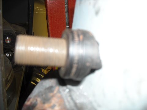 1979 Ford F-150 - A close-up view of a threaded metal component, possibly from a vehicle's mechanical system.