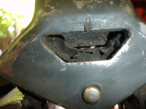 1995 Ford Taurus - This is a close-up view of a deteriorated rubber mount, likely a component of a larger assembly.