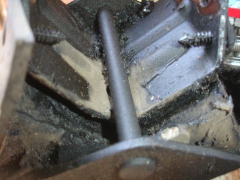 1995 Ford Taurus - A close-up view of a worn automotive component, likely related to the clutch or engine.