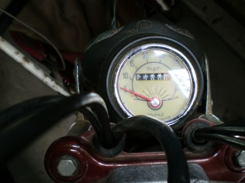 1981 Garelli Rally Sport - Close-up of a motorcycle's speedometer, indicating 75,556 miles.