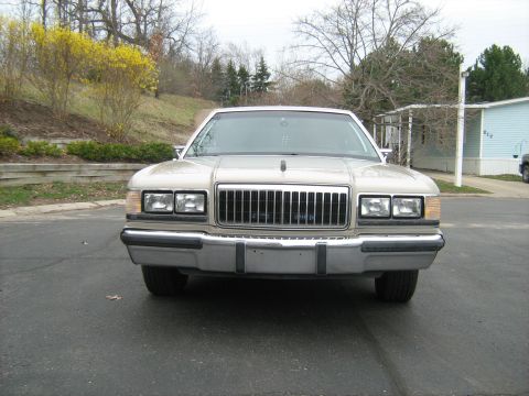 1988 Mercury Grand Marquis - Front view of a 1988 Mercury Grand Marquis parked on asphalt.