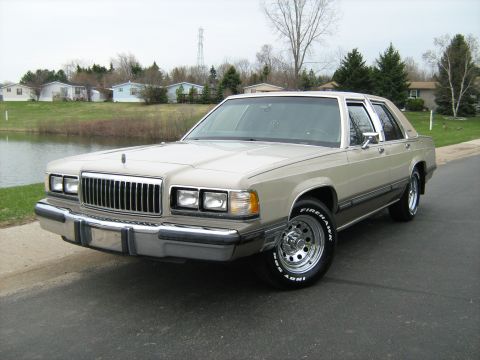 1988 Mercury Grand Marquis - This 1988 Mercury Grand Marquis sedan is seen from the front three-quarter view.