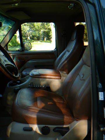 1992 Ford Bronco - Interior view of a vehicle's front seats and dashboard.