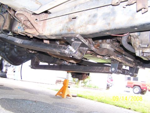 1982 Ford Bronco - The underside of a vehicle is shown, with a red truck in the background and a date stamp of 09/14/2008.