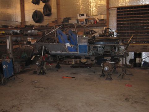1992 Ford Bronco - This custom off-road vehicle is in a state of disassembly, with its axles removed and body panels incomplete.