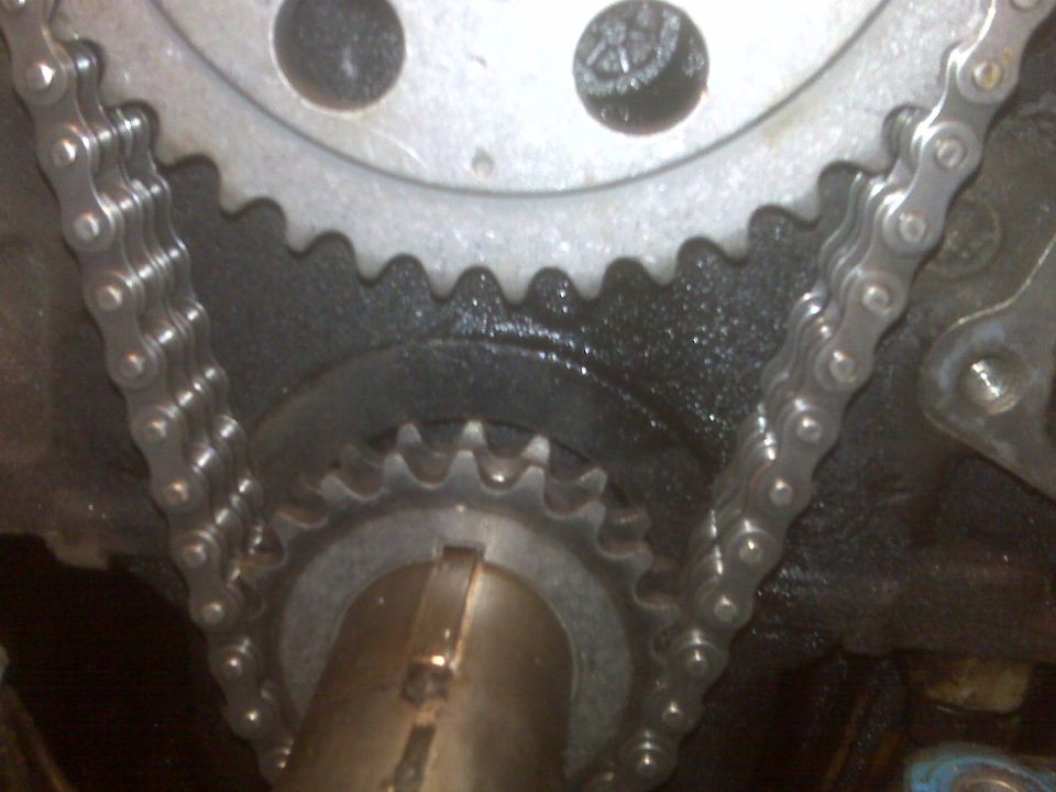 Close-up of engine timing chain and sprockets