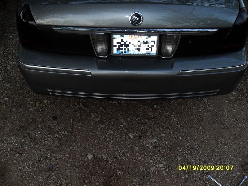 2004 Mercury Marquis rear bumper with chrome trim and license plate