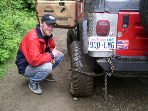 1979 Ford Bronco - Rear axel snapped, chained the wheel to the bumper.