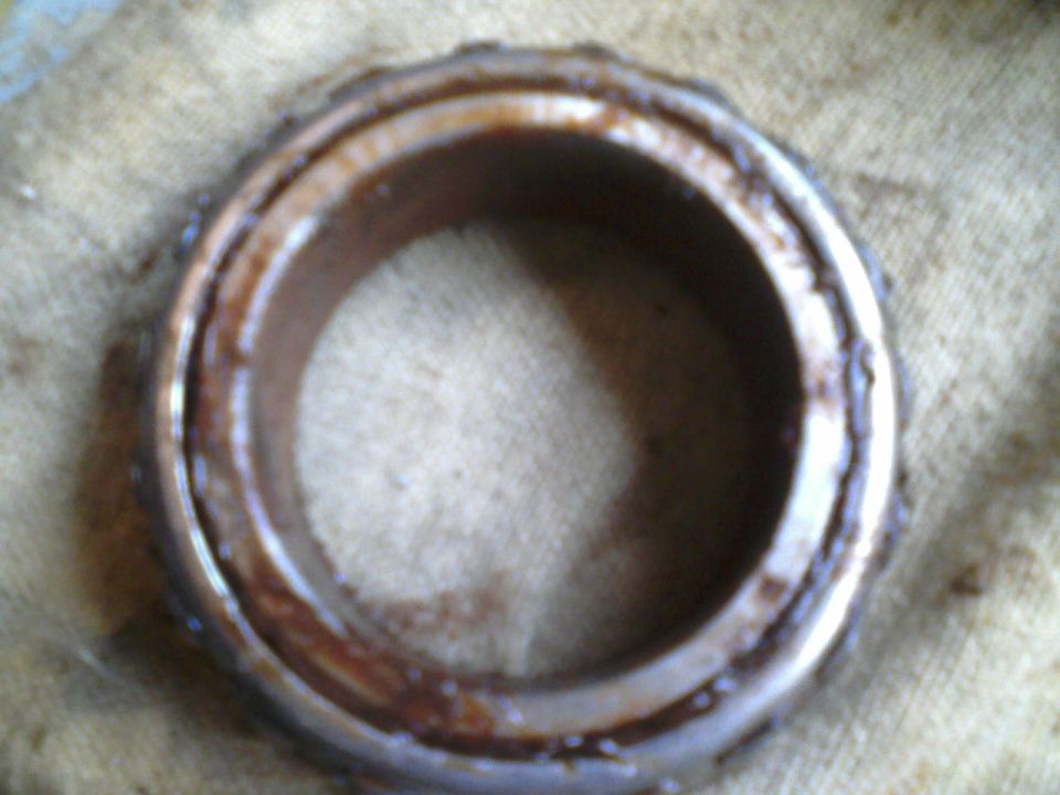 Used wheel bearing with grease and rust
