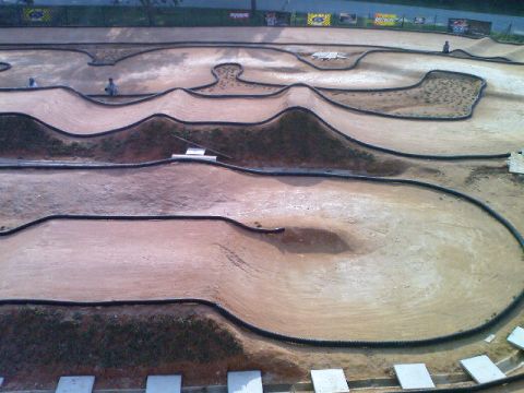 1986 Ford Bronco - Outdoor RC car track with multiple lanes and obstacles.