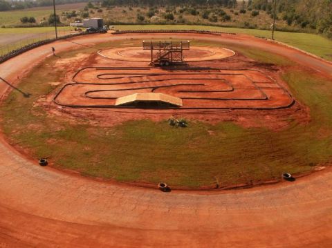 1986 Ford Bronco - An aerial view shows a winding dirt track designed for remote-controlled cars.